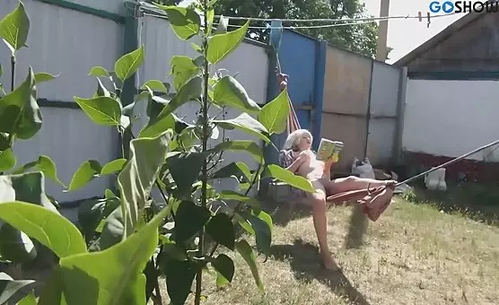 Outdoor Blonde Masturbates in Hammock